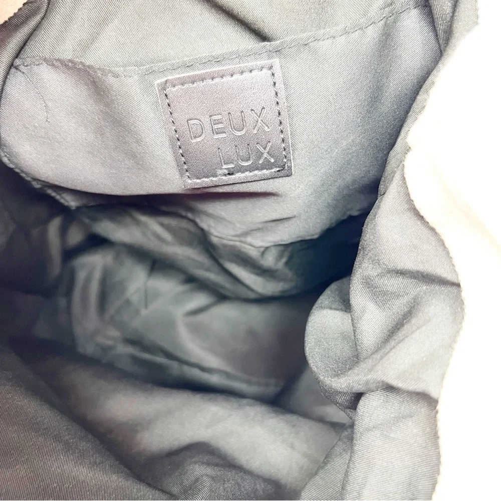 DEUX LUX OFF-WHITE CANVAS VEGAN BLACK LEATHER BACKPACK